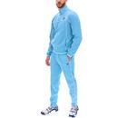 Model wearing full Fila Vintage Terry Retro 80s Piping Trim Funnel Neck Tracksuit in Air Blue